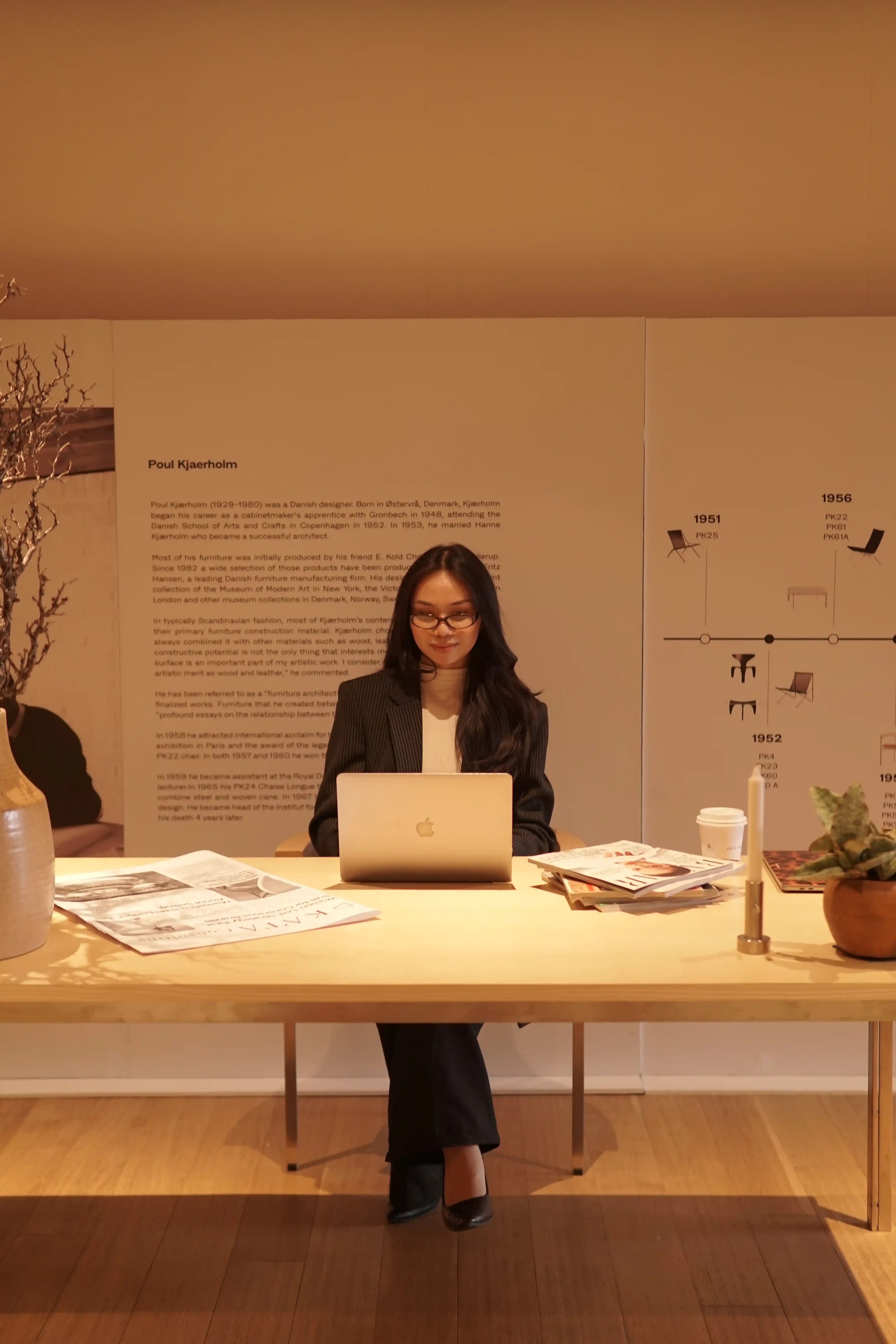 KATA team member reviewing a laptop with a colleague during the brand content shoot